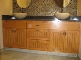 New bathroom with wooden cabinets